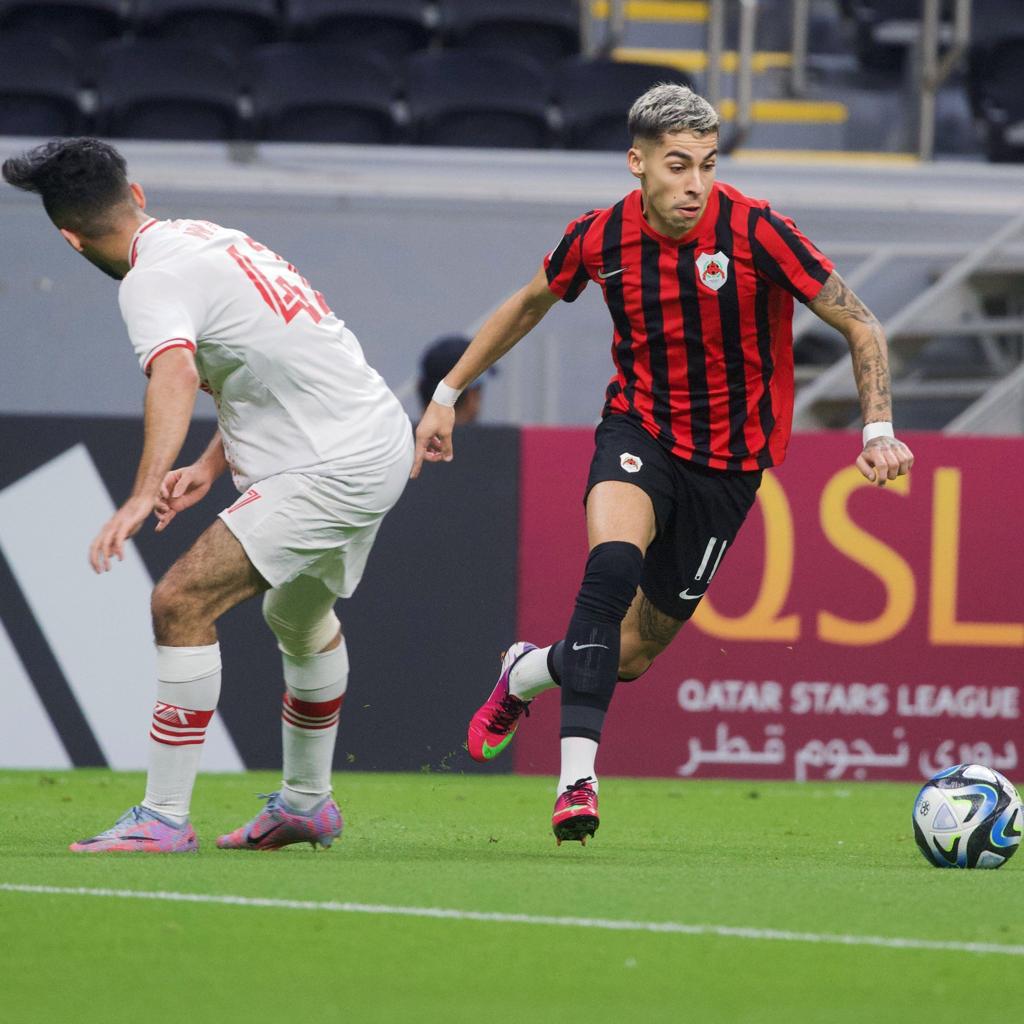 Mohamed El-Sayed (34) of Al Shamal evades a tackle during the QNB Stars  League game between Al Rayyan and Al Shamal at the Suheim bin Hamad Stadium  in Doha, Qatar on 11